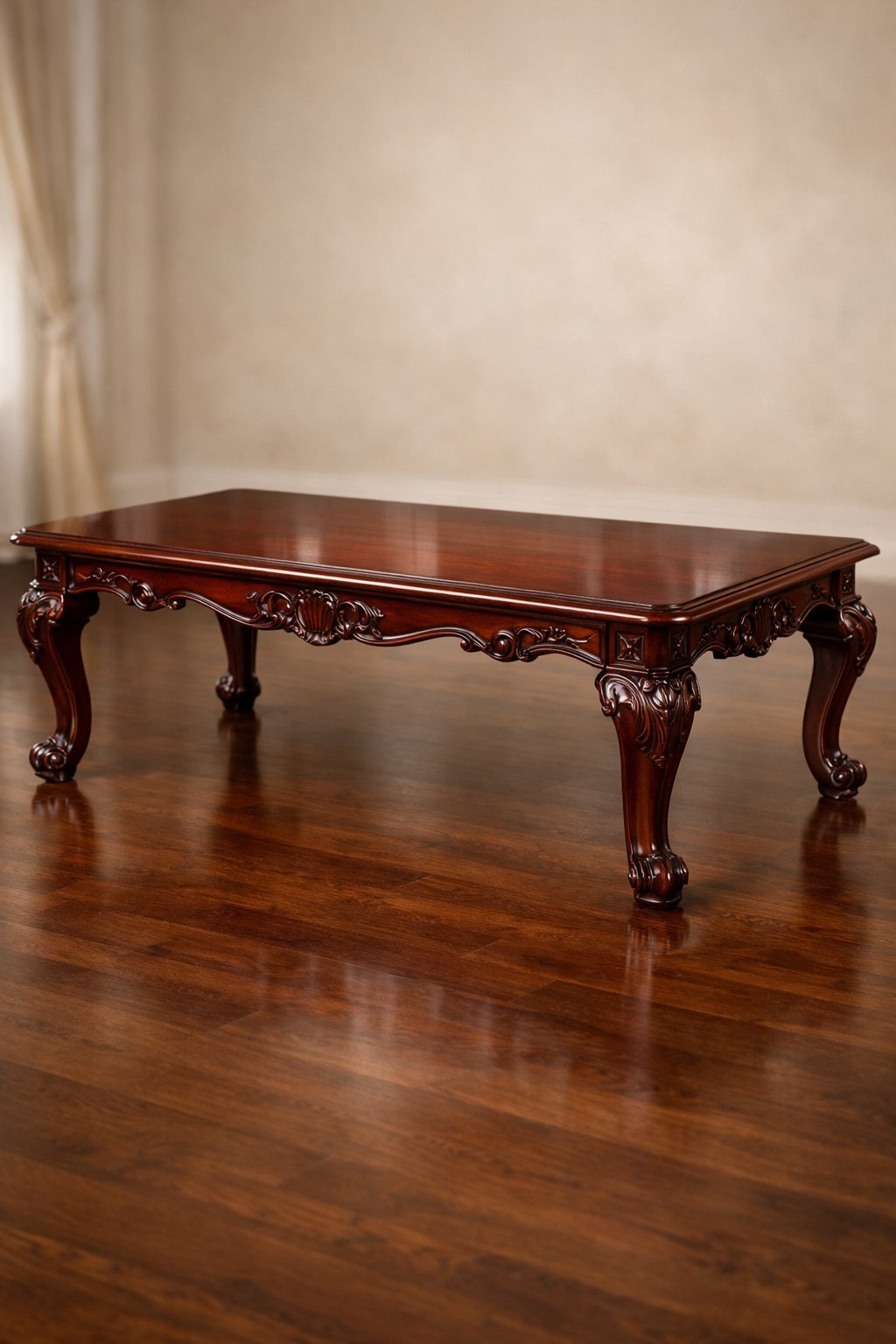 A rich mahogany dining table with carved legs in a well-lit dining room.